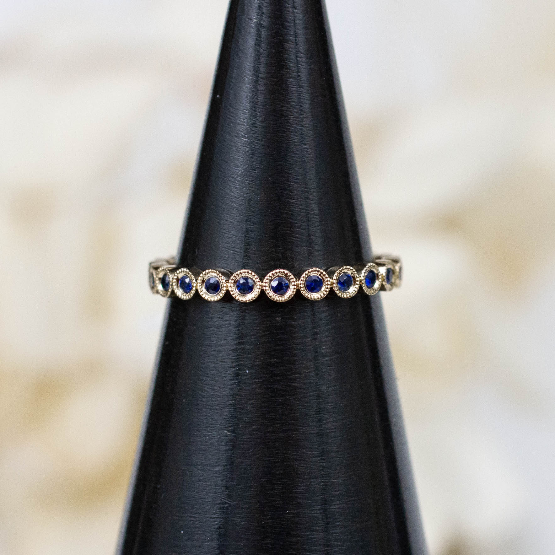 14K Blue Sapphire Bezel Round Eternity Band
